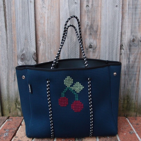 cross stitch on neoprene bag